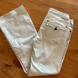 White boot cut low rise jeans